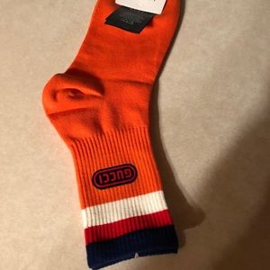 Gucci socks. Fits shoe size 6 to 11. New.